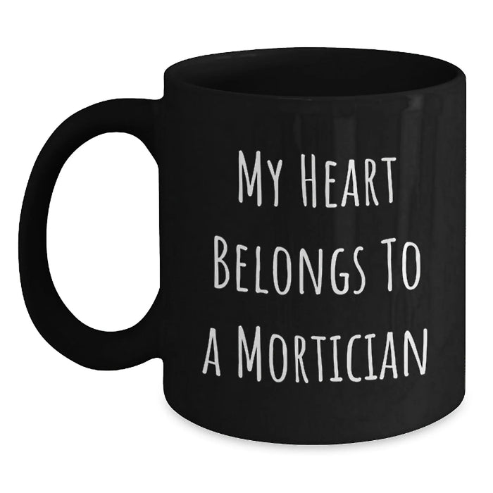 Funny Mortician Gifts for Men, Black Coffee Mug, 'My Heart Belongs To A Mortician', Unique Birthday Unique Gifts from Friends - Main