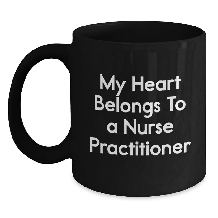 Funny Nurse Practitioner Gifts from Friends, Unique Birthday Unique Gifts for Nurse Practitioner, Black Coffee Mug with 'My Heart Belongs To A Nurse Practitioner' Quote - Main
