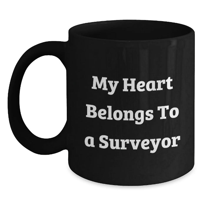 Funny Surveyor Gifts for Men, My Heart Belongs To A Surveyor Black Coffee Mug, Unique Birthday Unique Gifts from Friends - Main