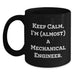 Funny Mechanical Engineer Gifts for Men - Black Coffee Mug 'Keep Calm, I'm (almost) A Mechanical Engineer' - Gifts from Men to Mechanical Engineering Graduates - Main