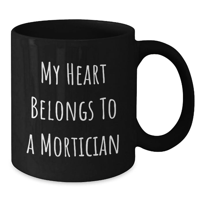 Funny Mortician Gifts for Men, Black Coffee Mug, 'My Heart Belongs To A Mortician', Unique Birthday Unique Gifts from Friends - Additional