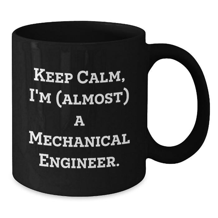 Funny Mechanical Engineer Gifts for Men - Black Coffee Mug 'Keep Calm, I'm (almost) A Mechanical Engineer' - Gifts from Men to Mechanical Engineering Graduates - Additional