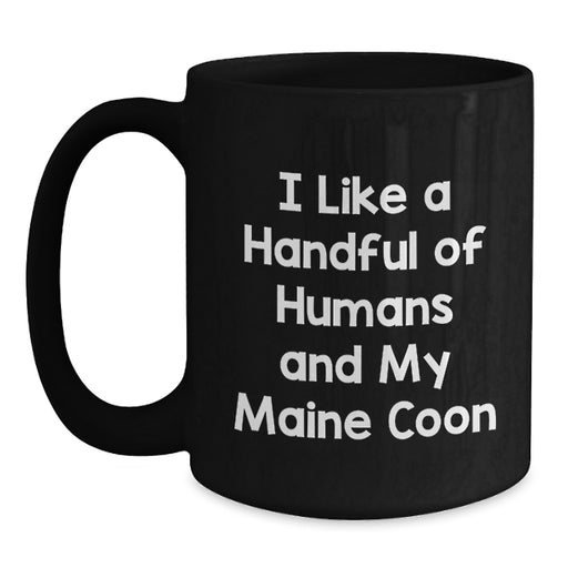 Funny Maine Coon Cat Lover Gifts, Black Coffee Mug for Friends, Family, or Coworkers - I Like A Handful Of Humans And My Maine Coon - Main
