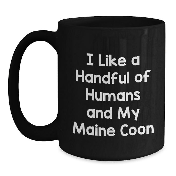 Funny Maine Coon Cat Lover Gifts, Black Coffee Mug for Friends, Family, or Coworkers - I Like A Handful Of Humans And My Maine Coon - Main