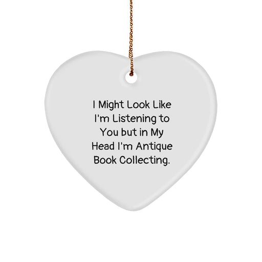 Funny Antique Book Collecting Gifts from Friends, Heart Ornament for Christmas, 'I Might Look Like I'm Listening To You But In My Head I'm Antique Book Collecting.' - Image 1