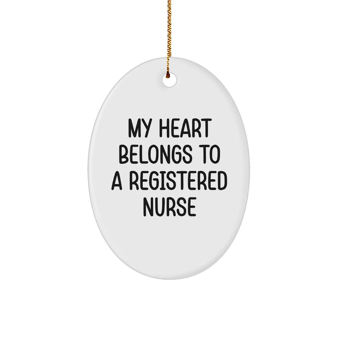 Funny My Heart Belongs To A Registered Nurse Christmas Oval Ornament Gifts from Friends, Coworkers, or Family - Image 1