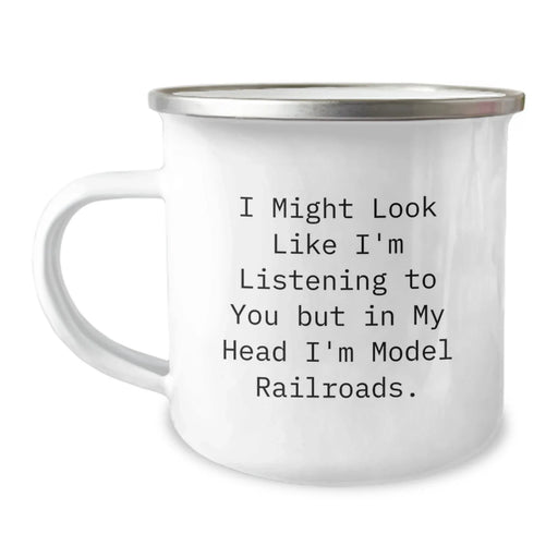 Funny Model Railroads Lovers Gifts from Friends for Men, Unique Camping Mug for Graduation, I Might Look Like I'm Listening To You But In My Head I'm Model Railroads. - Image 1