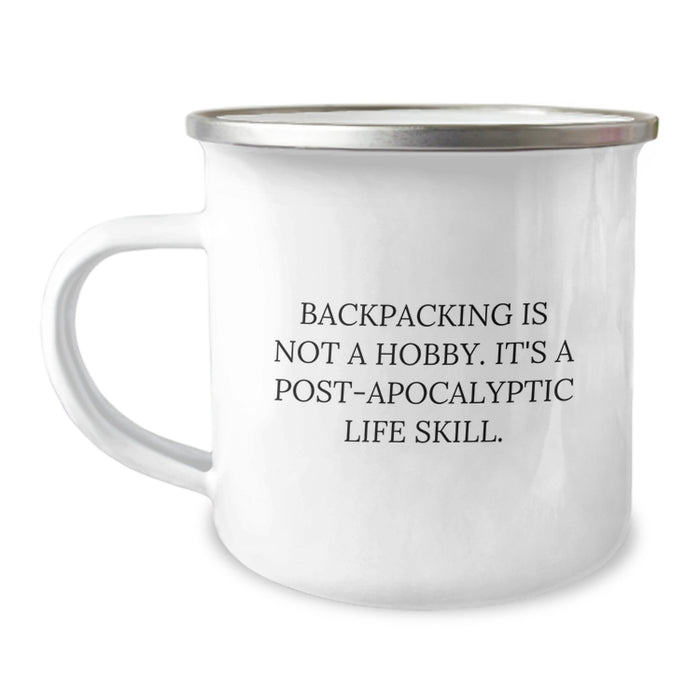Funny Backpacking Gifts for Graduation - 'Backpacking Is Not A Hobby. It's A Post-apocalyptic Life Skill.' Camping Mug for Men and Women - Image 1