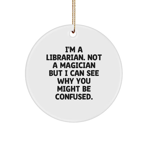 Funny Librarian Gifts for Christmas, Circle Ornament from Friends or Family, 'I'm A Librarian. Not A Magician...' - Image 1