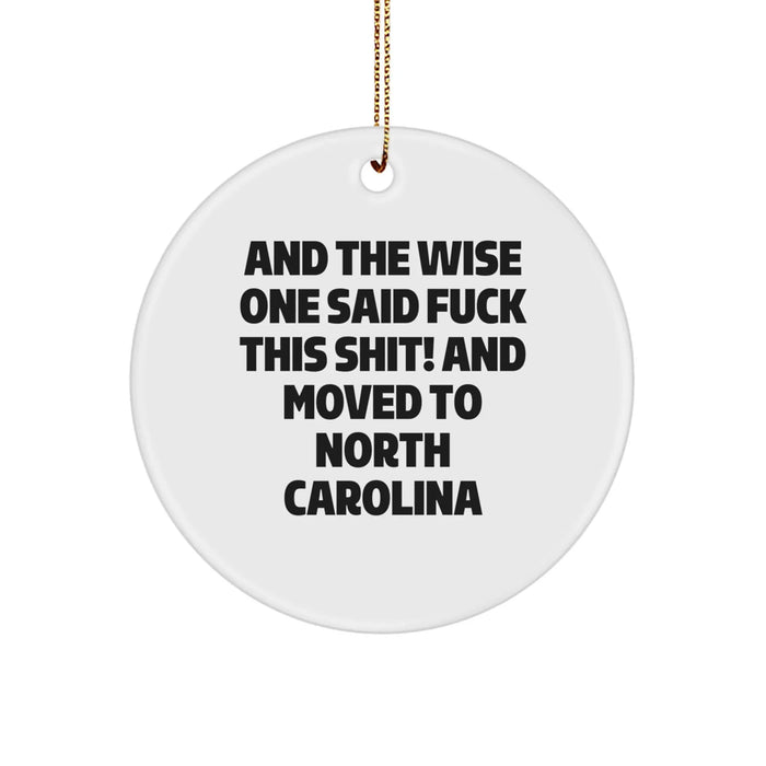 Funny North Carolina Gifts from Friends, Circle Ornament for Christmas Unique Gifts for Men, Women, North Carolina Residents, 'And The Wise One Said F--k This Shit! And Moved To North Carolina' Quote - Image 1