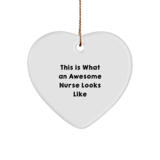 Funny Nurse Heart Ornament Gifts from Friends & Family, 'This Is What An Awesome Nurse Looks Like' Heart Shaped Ornament for Nurses - Image 1