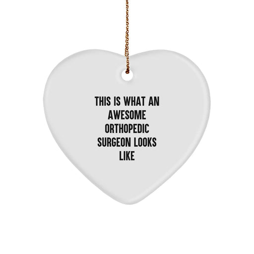 Funny Orthopedic Surgeon Gifts - Heart Ornament for Christmas Unique Gifts from Family, Funny Quote 'This Is What An Awesome Orthopedic Surgeon Looks Like' - Image 1