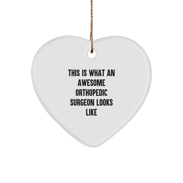 Funny Orthopedic Surgeon Gifts - Heart Ornament for Christmas Unique Gifts from Family, Funny Quote 'This Is What An Awesome Orthopedic Surgeon Looks Like' - Image 1