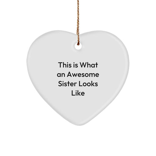 Funny Sister Gifts for Christmas, Heart Ornament - 'This Is What An Awesome Sister Looks Like' - Gifts from Sister to Sister - Image 1