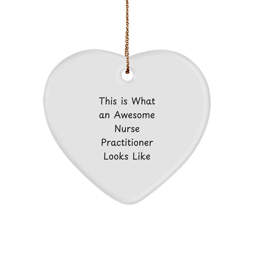 Funny Nurse Practitioner Gifts from Men, Christmas Unique Gifts for Nurse Practitioner, Heart Ornament with This Is What An Awesome Nurse Practitioner Looks Like Quote - Image 1