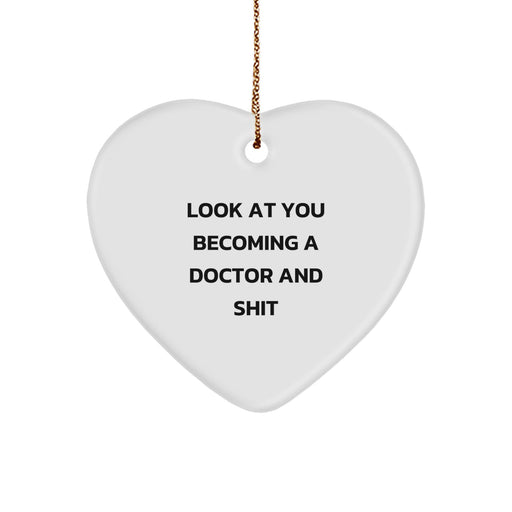 Funny Doctor Gifts for Him or Her, 'Look At You Becoming A Doctor And Shit' Heart Ornament, Gifts from Friends, Family, or Coworkers for Christmas - Image 1