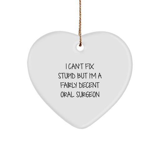 Funny Oral Surgeon Gifts from Friends for Men Heart Ornament, Inspirational I Can't Fix Stupid But I'm A Fairly Decent Oral Surgeon Christmas Unique Gifts - Image 1