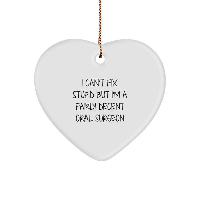 Funny Oral Surgeon Gifts from Friends for Men Heart Ornament, Inspirational I Can't Fix Stupid But I'm A Fairly Decent Oral Surgeon Christmas Unique Gifts - Image 1