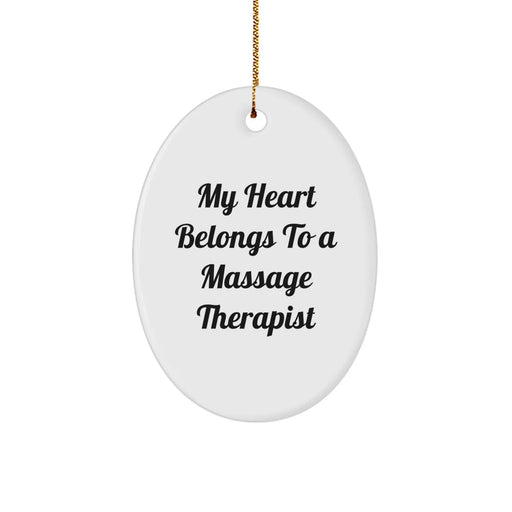Funny Massage Therapist Gift, My Heart Belongs To A Massage Therapist, Oval Ornament Christmas Unique Gifts from Friends to Family - Image 1