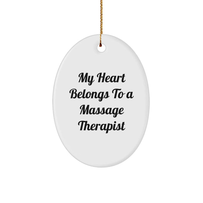 Funny Massage Therapist Gift, My Heart Belongs To A Massage Therapist, Oval Ornament Christmas Unique Gifts from Friends to Family - Image 1