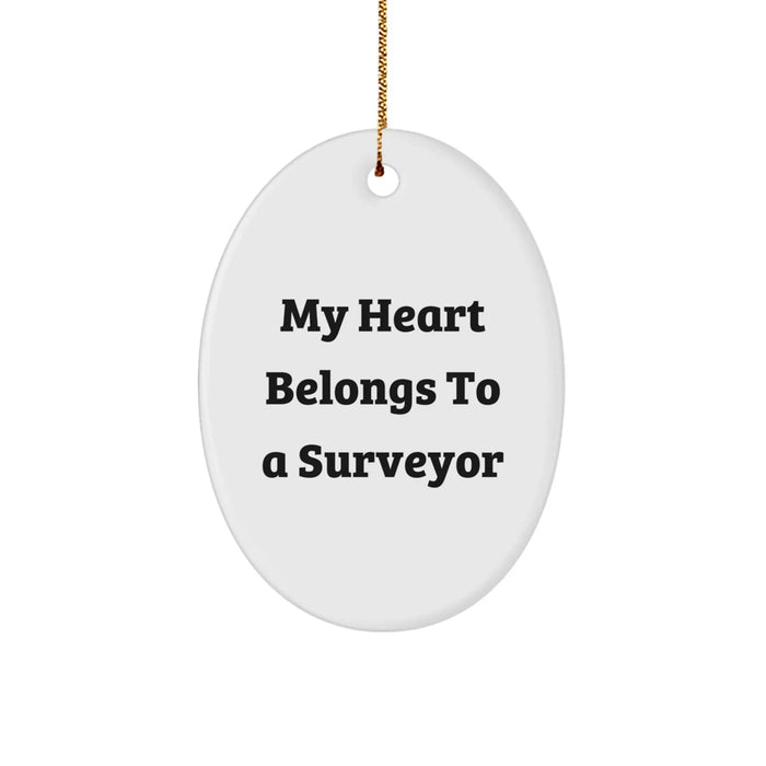 Funny Surveyor Christmas Unique Gifts for Surveyor Lovers, Oval Ornament with 'My Heart Belongs To A Surveyor' Quote, Gifts from Friends to Surveyor - Image 1