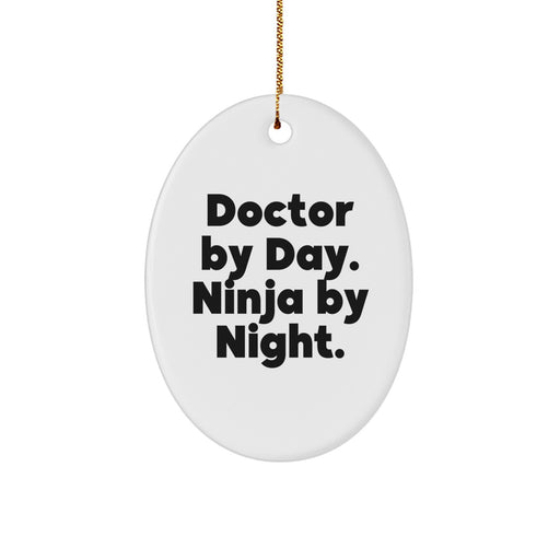 Funny Doctor Gifts for Men from - 'Doctor By Day. Ninja By Night.' Oval Ornament, White, Christmas - Image 1
