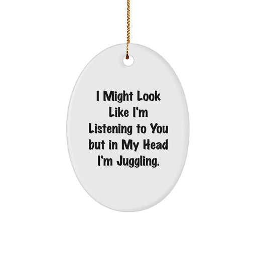 Funny Juggling Gifts from Friends for Christmas - Oval Ornament with 'I Might Look Like I'm Listening To You But In My Head I'm Juggling.' Quote - Image 1