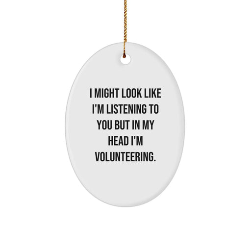 Volunteering Gifts - 'I Might Look Like I'm Listening...' Oval Ornament, Funny Quote, White, 3.25" Tall, Christmas Unique Gifts from Family to Friends - Image 1