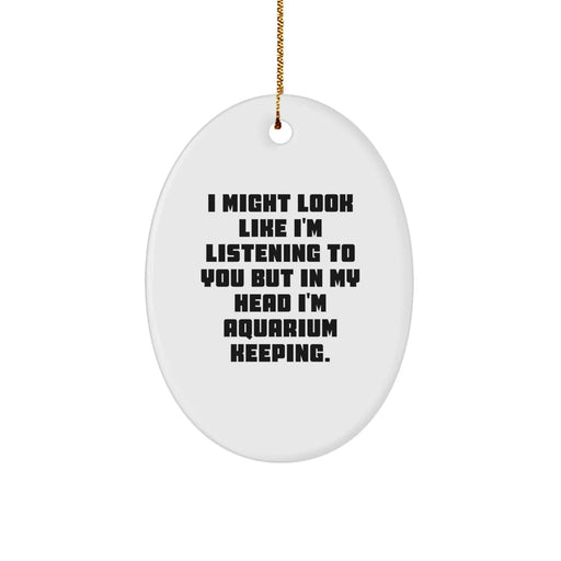 Funny Aquarium Keeping Gifts for Friends from Men, Oval Ornament, White, 3.25'' Tall, 'I Might Look Like I'm Listening To You But In My Head I'm Aquarium Keeping.' Quote for Christmas - Image 1