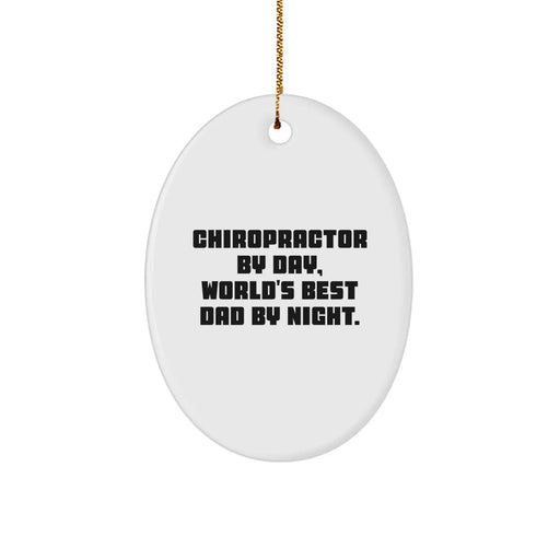 Funny Chiropractor Gifts, Christmas Unique Decorations, Oval Ornament for Chiropractor By Day, World's Best Dad By Night. - Image 1