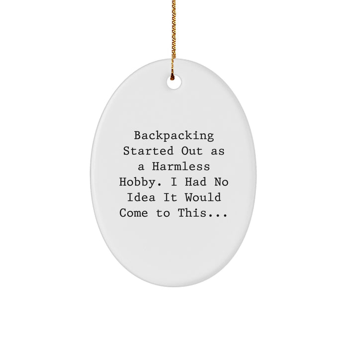 Funny Backpacking Gifts for Men, Women, or Friends - Oval Ornament 'Backpacking Started Out As A Harmless Hobby...' Christmas Unique Gifts from - Image 1