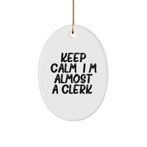 Funny Clerk Oval Ornament Gifts from Friends for Christmas Office Decorations, 'Keep Calm, I'm (almost) A Clerk.' - Image 1