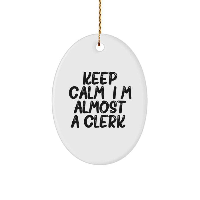 Funny Clerk Oval Ornament Gifts from Friends for Christmas Office Decorations, 'Keep Calm, I'm (almost) A Clerk.' - Image 1