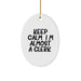 Funny Clerk Oval Ornament Gifts from Friends for Christmas Office Decorations, 'Keep Calm, I'm (almost) A Clerk.' - Image 1