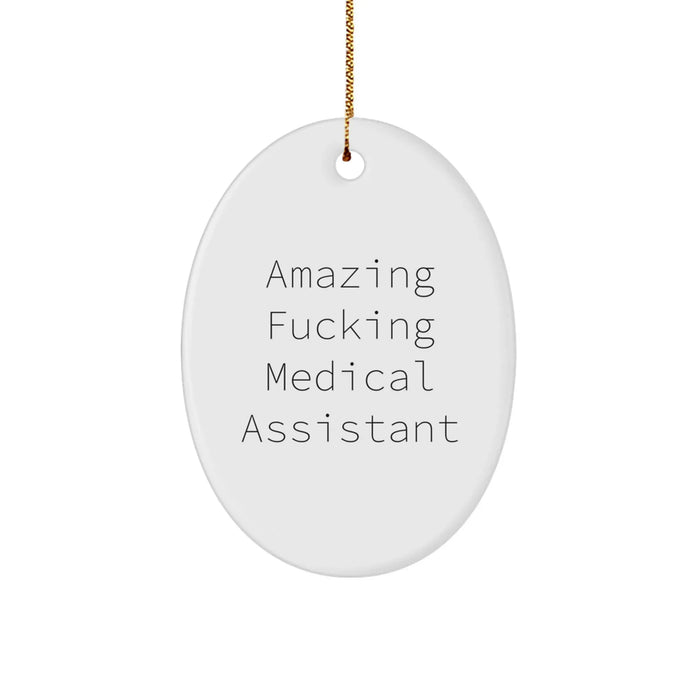 Funny Medical Assistant Gifts from Friends, Unique Oval Ornament for Medical Assistant, 'Amazing F--king Medical Assistant' Quote on Christmas - Image 1