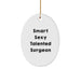 Funny Surgeon Gifts for Men - Smart Sexy Talented Surgeon Oval Ornament, White, 3.25" Tall - Unique Christmas Unique Gifts from Friends to Coworkers - Image 1