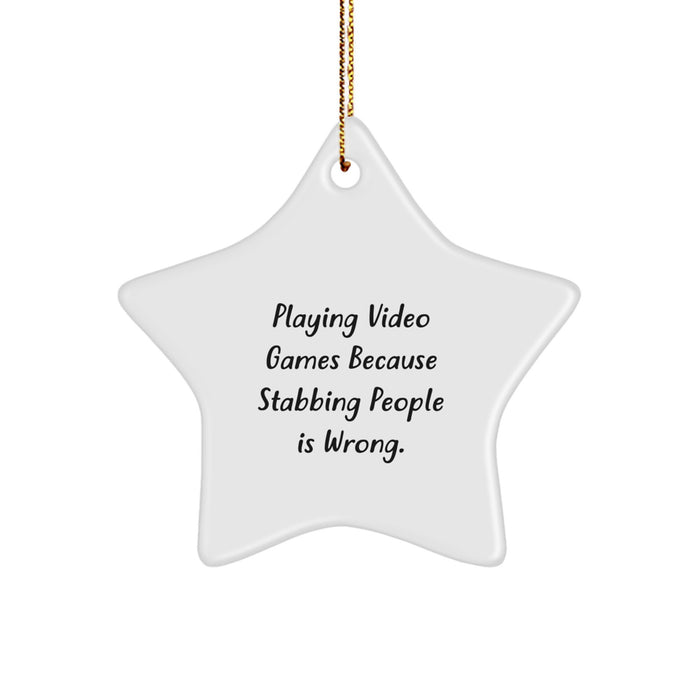 Fun Star Ornaments for Playing Video Games Enthusiasts - Gifts from Friends and Family for Christmas - Playing Video Games Star Ornament - 'Playing Video Games Because Stabbing People Is Wrong.' - Image 1